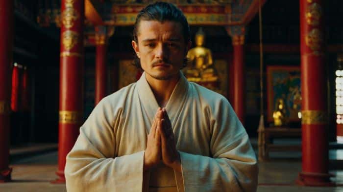Orlando bloom praying in buddhist monastery