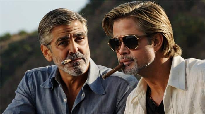 Pitt and Clooney Enjoying a cigar
